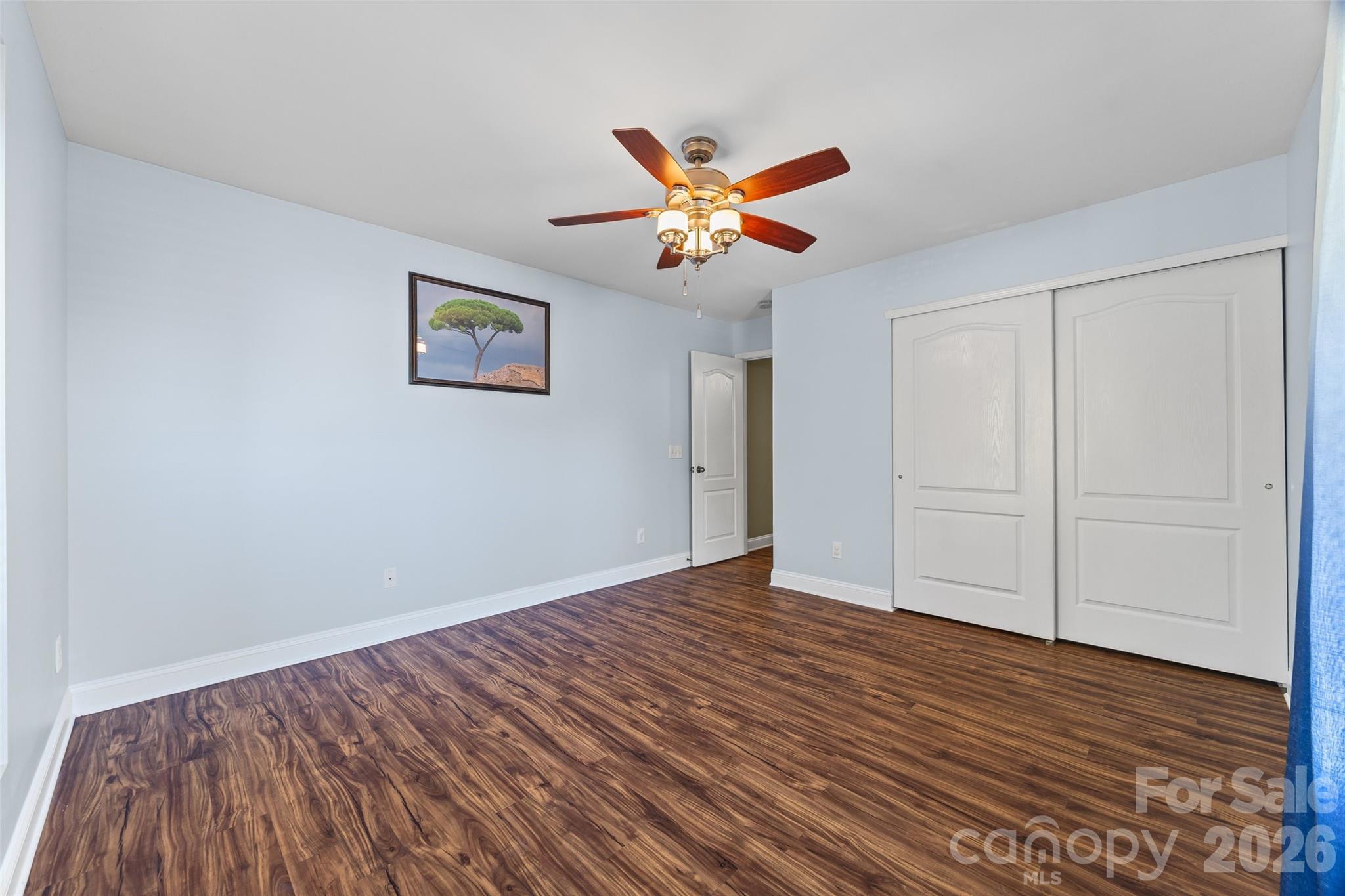 240 Loch Stone Street Fort Mill, SC 29715 - Photo 30 of 45 a view of empty room with wooden floor