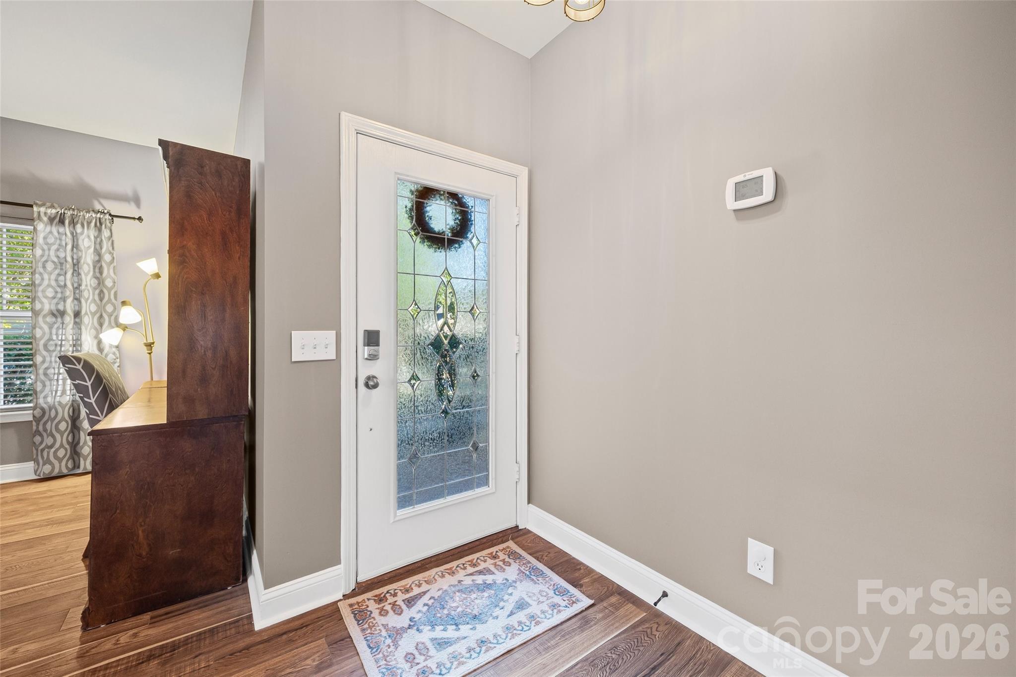 240 Loch Stone Street Fort Mill, SC 29715 - Photo 3 of 45 a view of an empty room and glass door