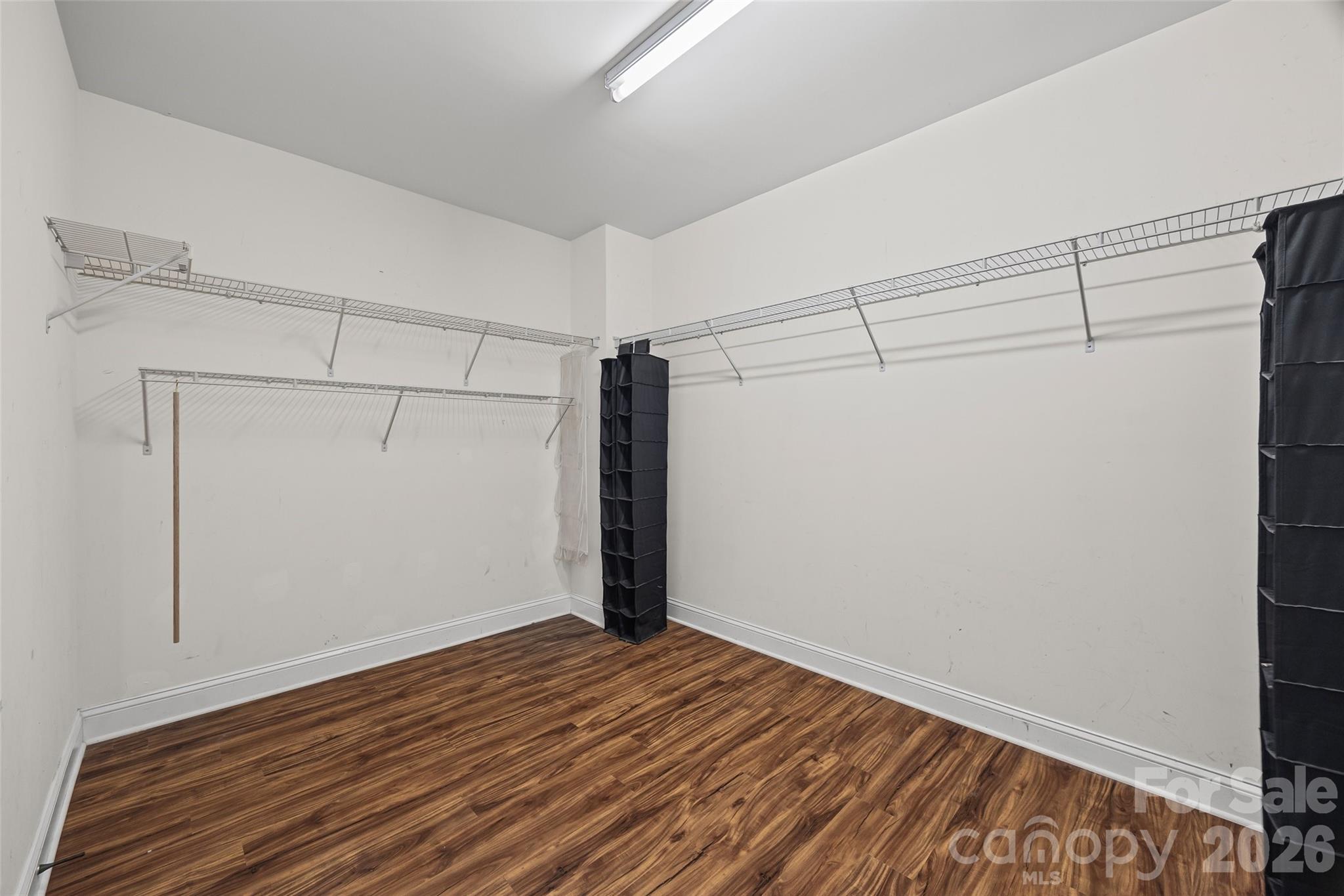 240 Loch Stone Street Fort Mill, SC 29715 - Photo 41 of 45 a view of a room with wooden floor