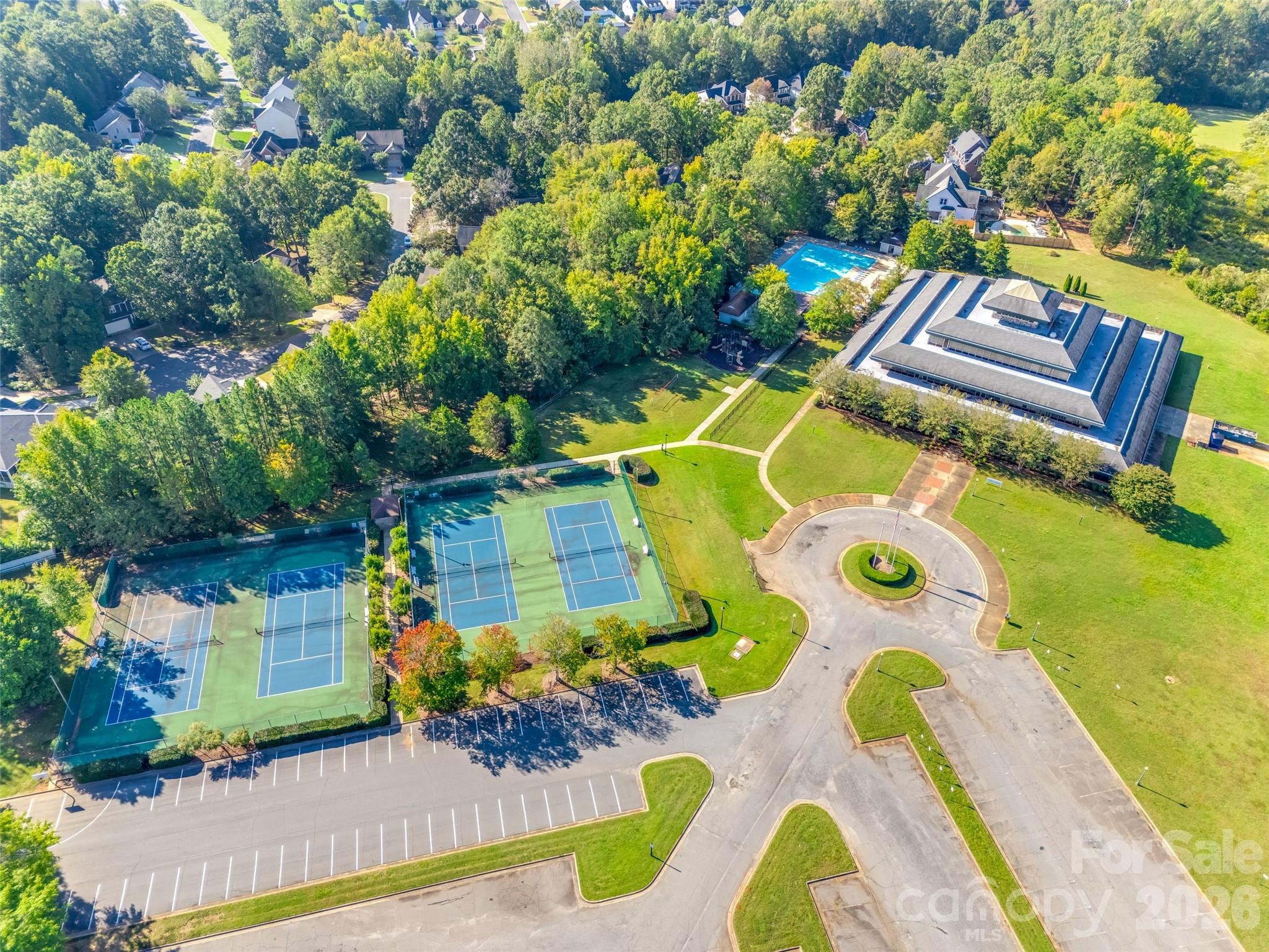 240 Loch Stone Street Fort Mill, SC 29715 - Photo 45 of 45 a view of a swimming pool with some potted plants