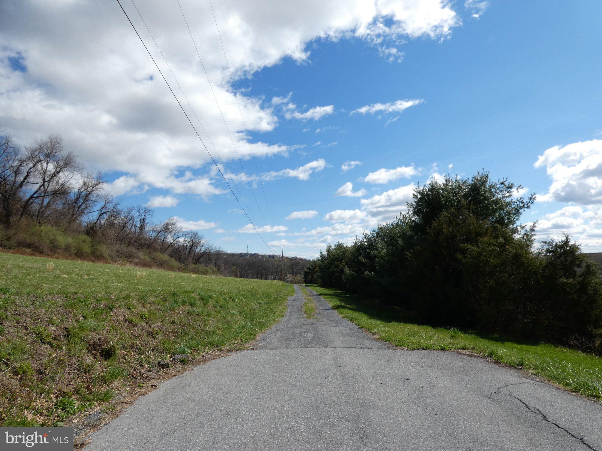 0 Short Lane Kutztown, PA 19530 - Photo 1 of 5 Serene country road under blue skies.