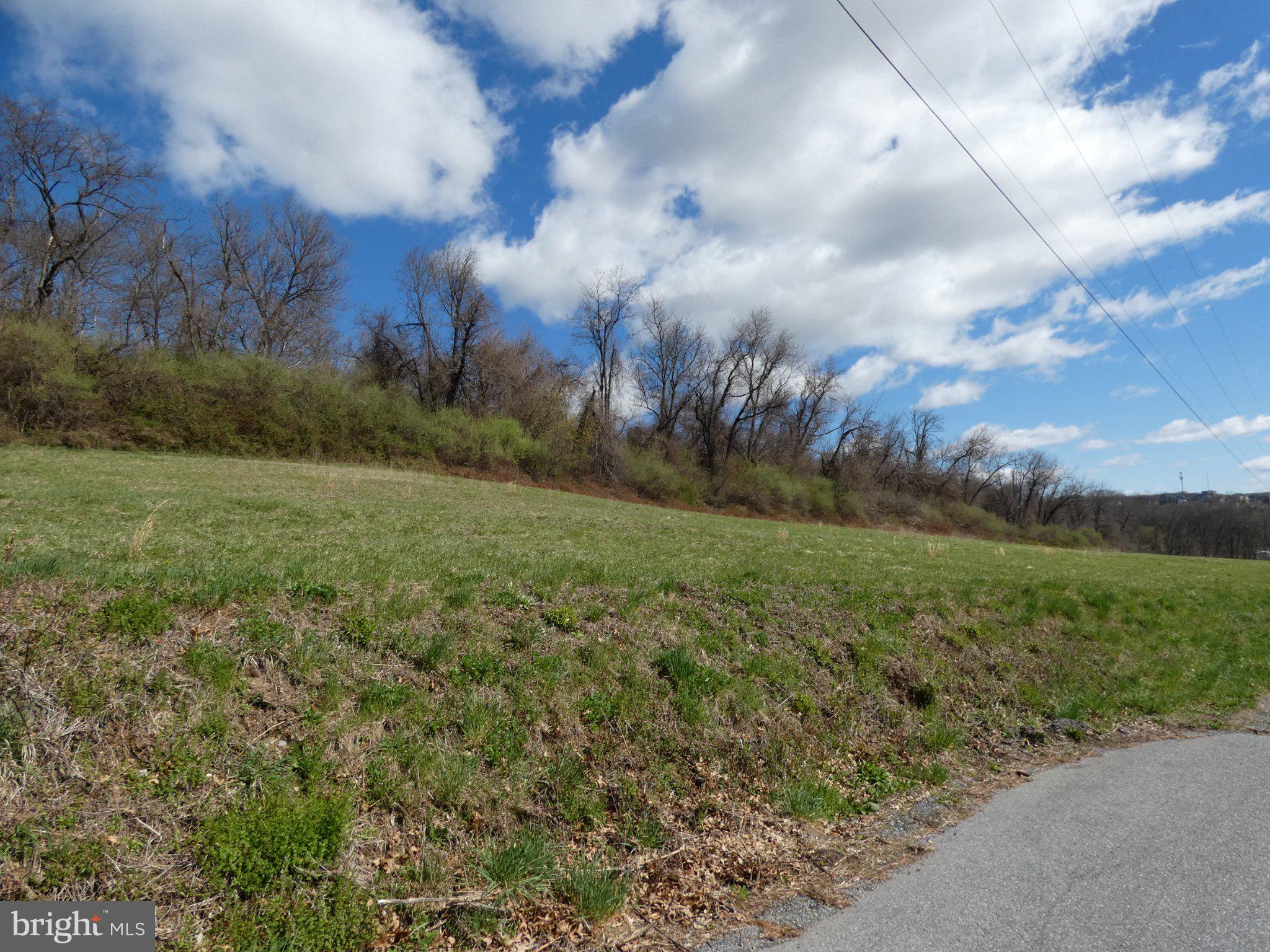 0 Short Lane Kutztown, PA 19530 - Photo 3 of 5 Serene landscape under blue skies.