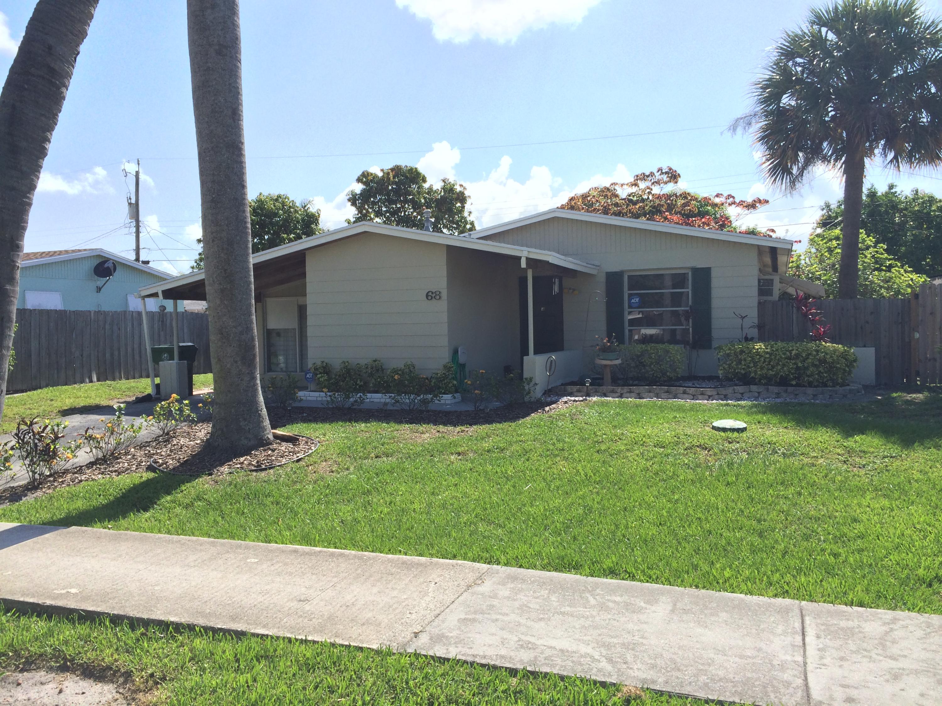 68 Davis Road Palm Springs, FL 33461 - Photo 1 of 16 Front