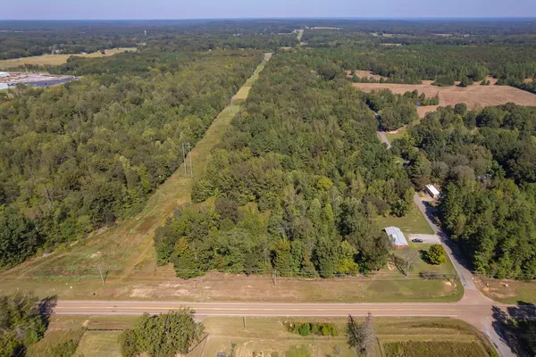 a view of a yard with an outdoor space