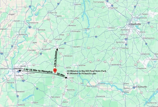 a sign that is sitting in front of a white wall