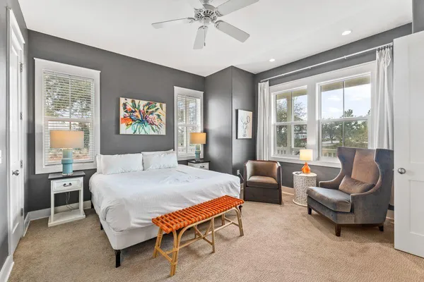 a bedroom with a bed and a couch