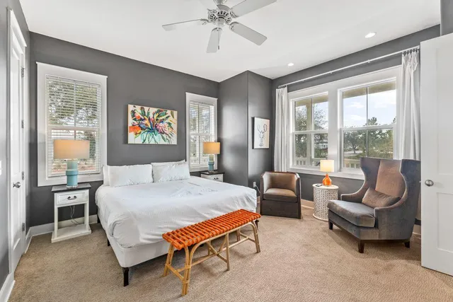 a bedroom with a bed and a couch