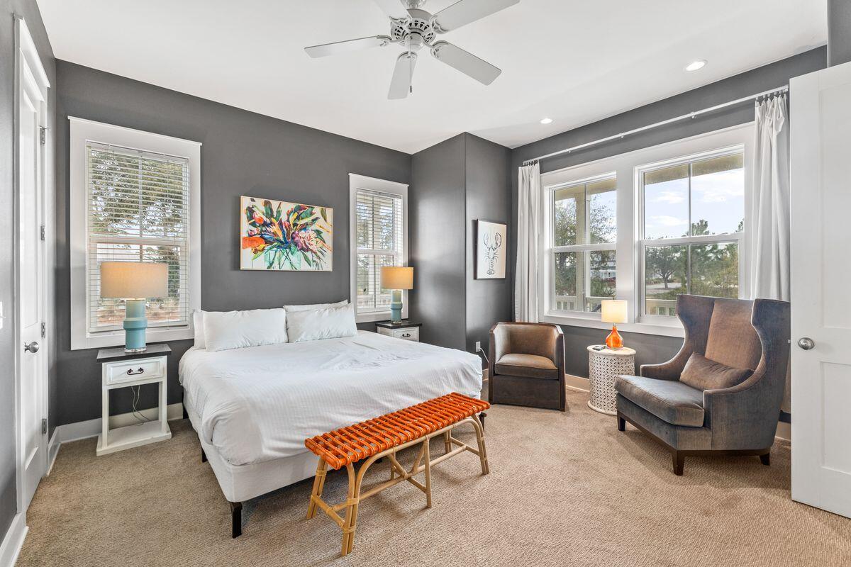 102 Goldfish Court Port St. Joe, FL 32456 - Photo 20 of 31 a bedroom with a bed and a couch