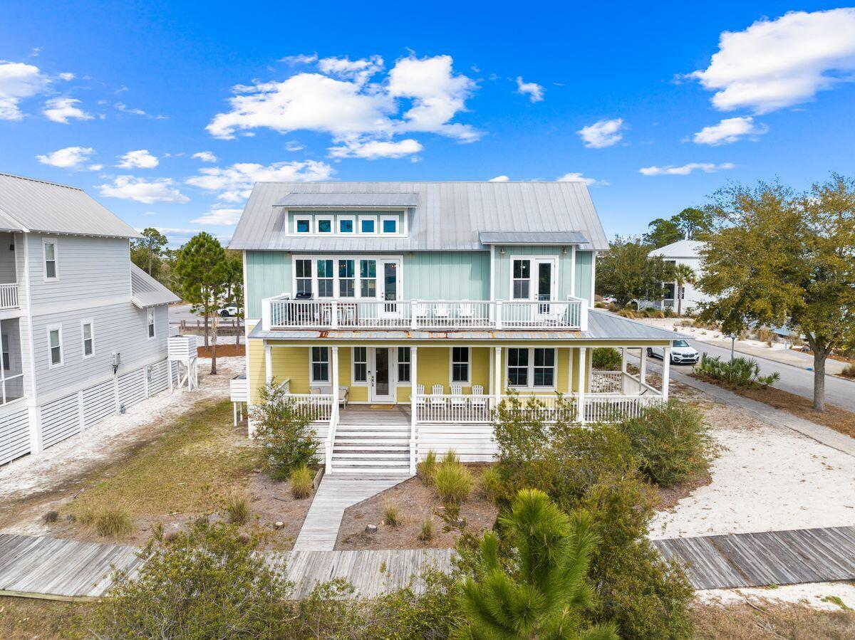 102 Goldfish Court Port St. Joe, FL 32456 - Photo 4 of 31 a front view of a house with a yard