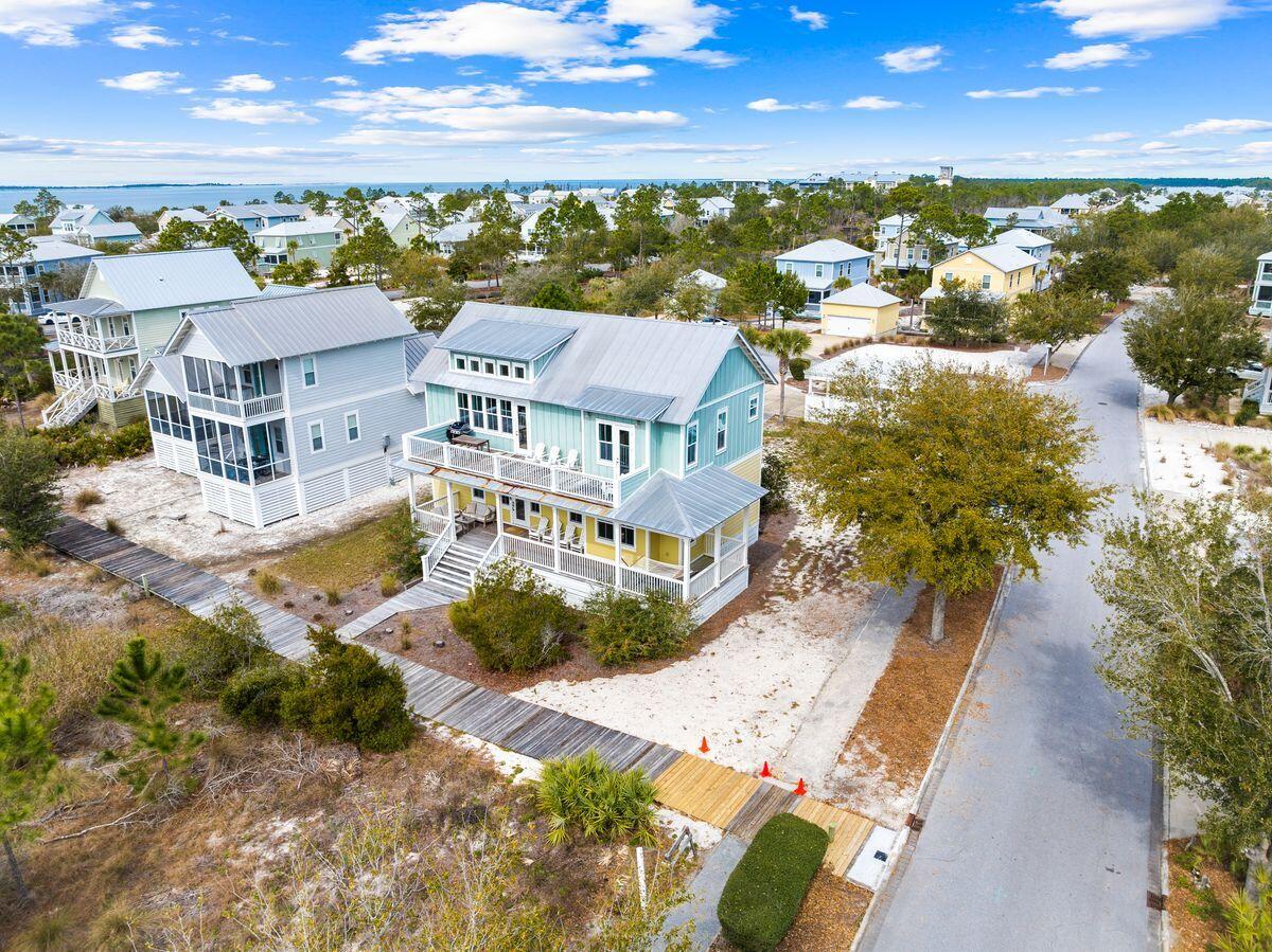 102 Goldfish Court Port St. Joe, FL 32456 - Photo 5 of 31 a view of a city with lawn chairs