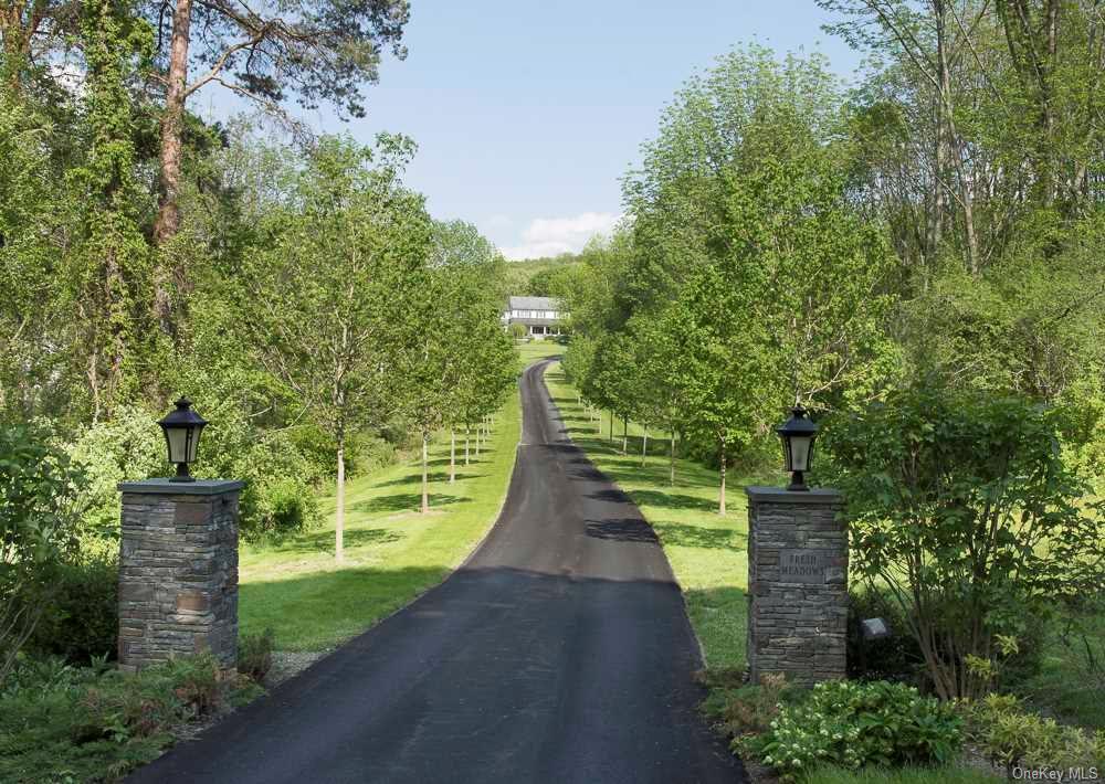 a view of a pathway with a park