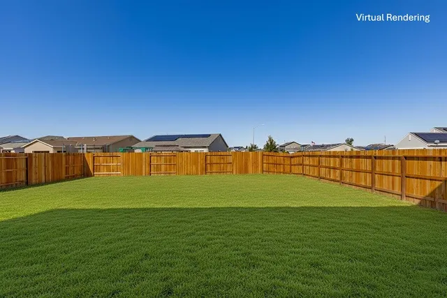 a view of dirt yard with ocean view
