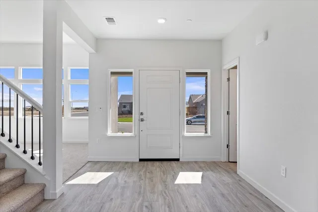 an empty room with windows