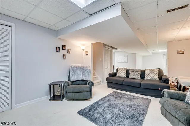 a living room with furniture and a couch