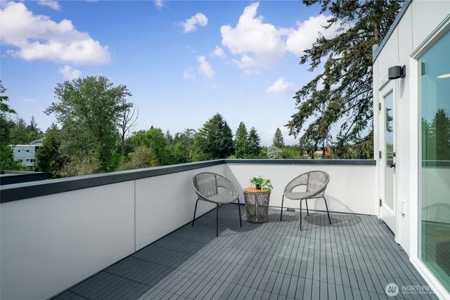 a view of balcony with furniture