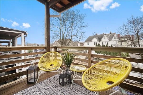 a view of a swimming pool with a lounge chairs