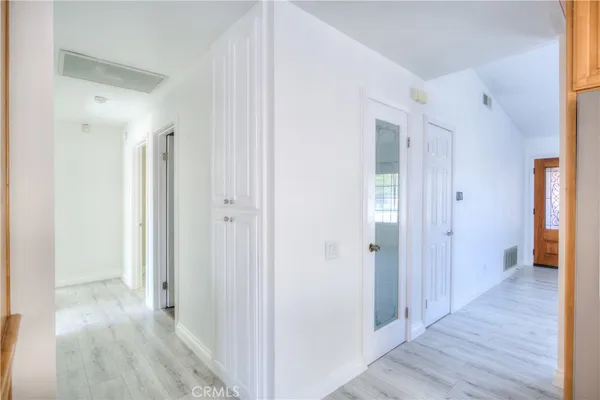 a room with a bed and a window