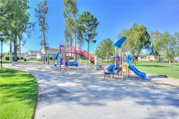 a view of yard with swimming pool