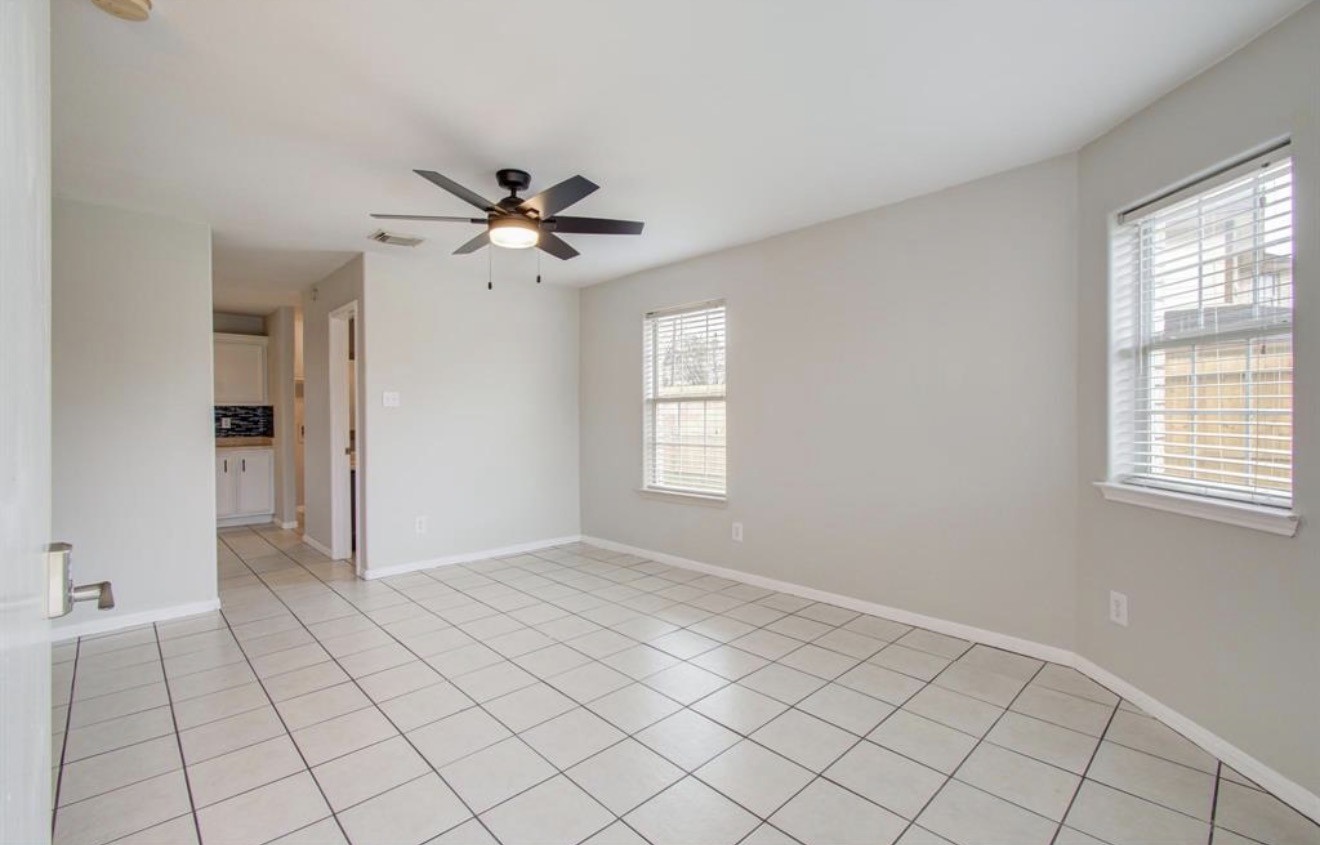 3131 Chaffin Street Houston, TX 77087 - Photo 4 of 11 a view of an empty room with a window