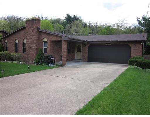 65 Spring Valley Drive Washington, PA 15301 - Photo 1 of 11 Exterior Front. Beautiful brick home with covered main level entry and 2 car attached garage.