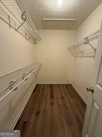 a view of a room with racks on the wall