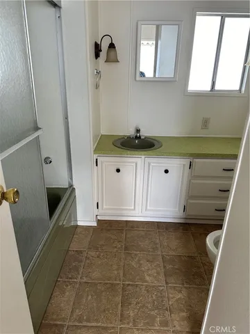 a view of cabinets with wooden floor