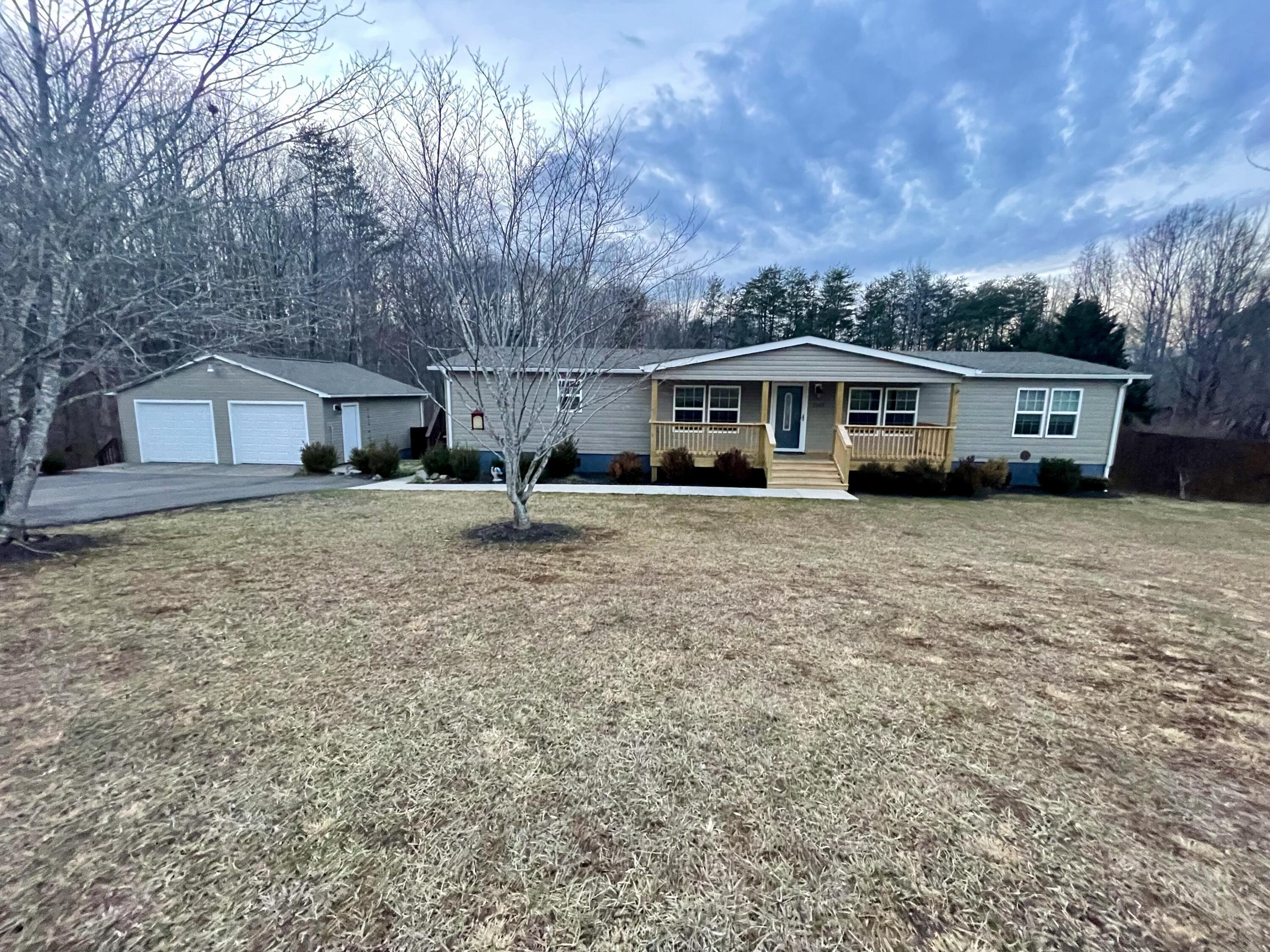 2143 Deep Woods Road Hardy, VA 24101 - Photo 1 of 27 a view of a house with a yard
