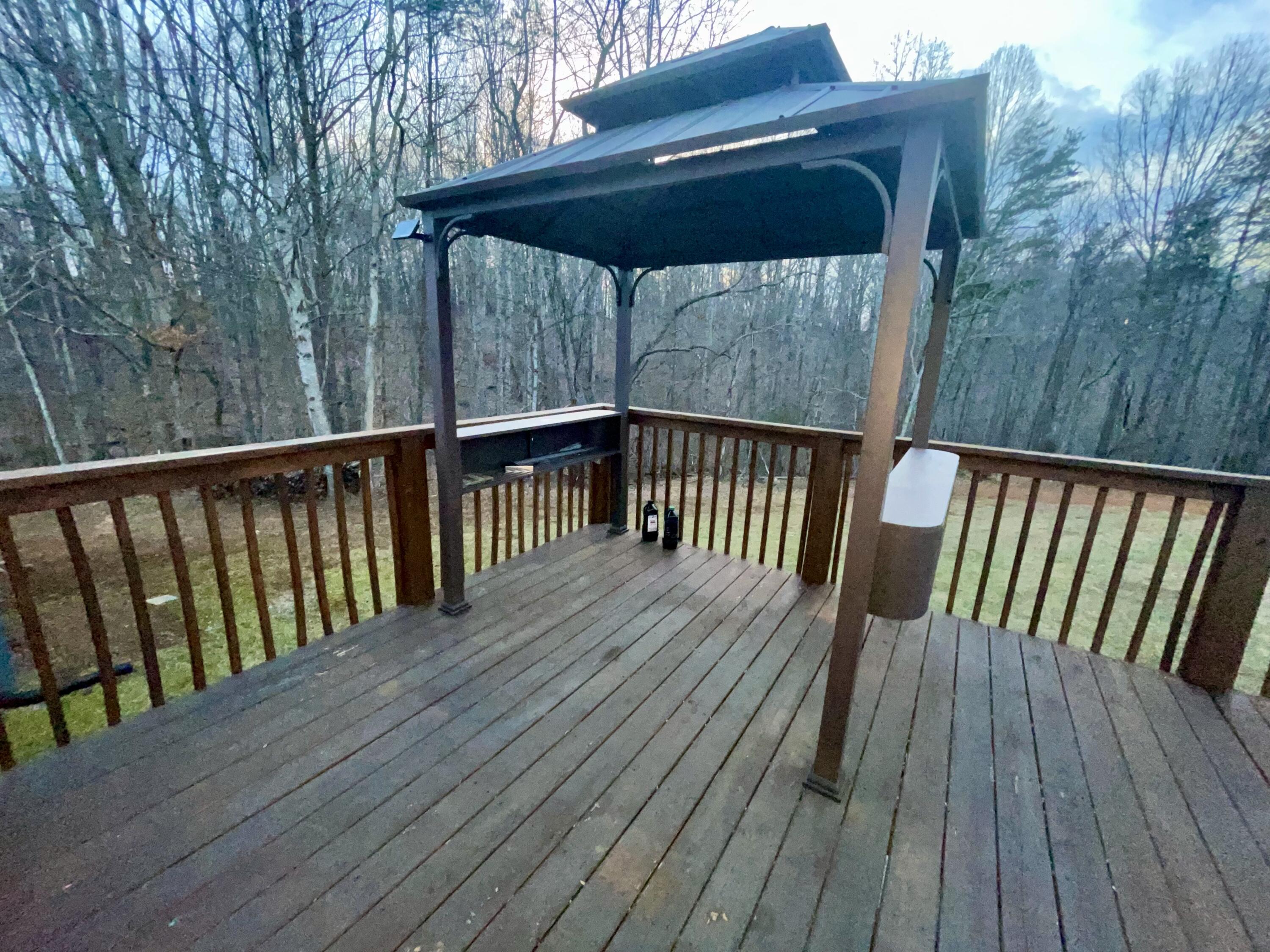 2143 Deep Woods Road Hardy, VA 24101 - Photo 22 of 27 a view of deck with wooden floor and outdoor seating