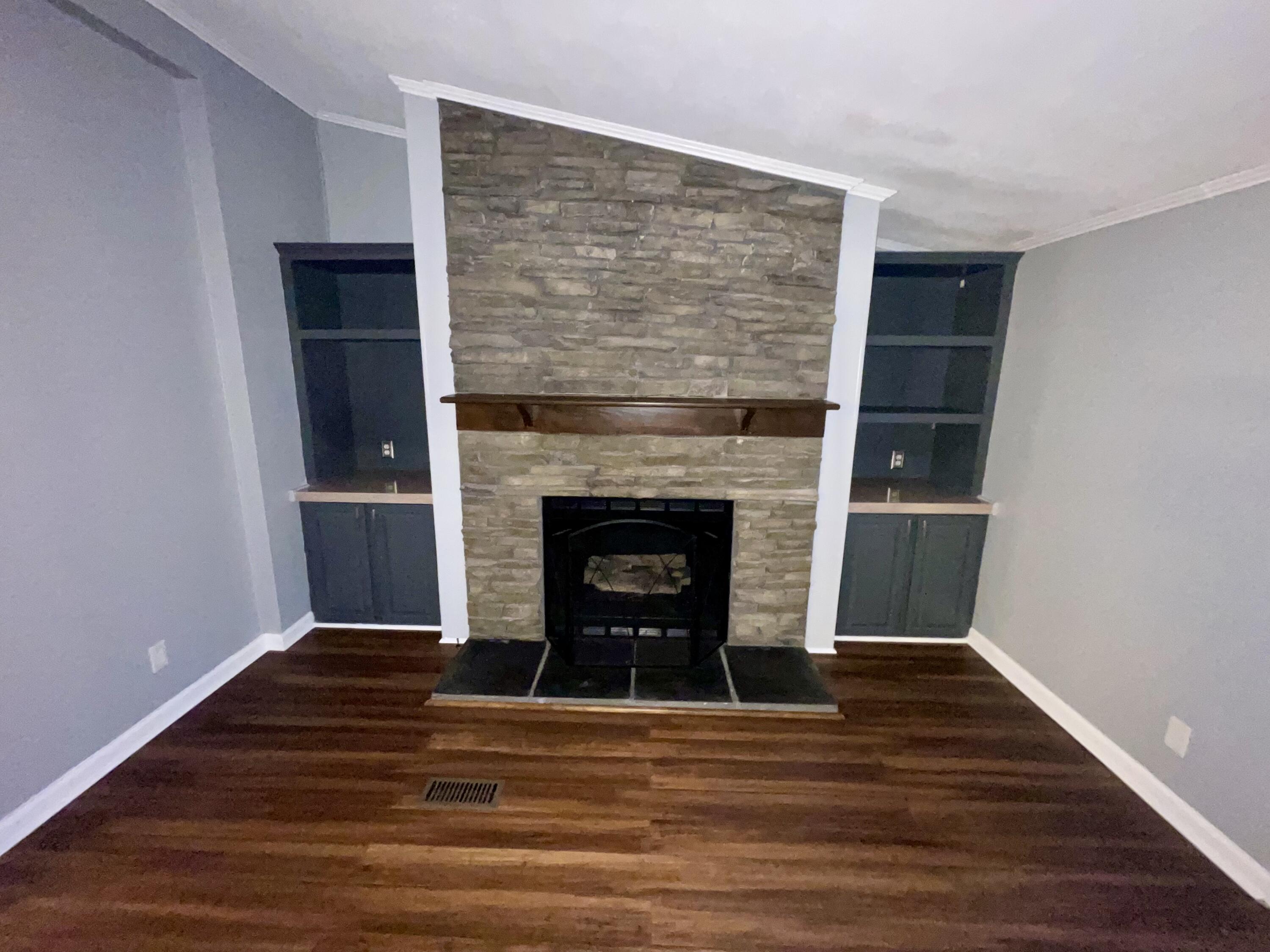 2143 Deep Woods Road Hardy, VA 24101 - Photo 8 of 27 a living room with a fireplace