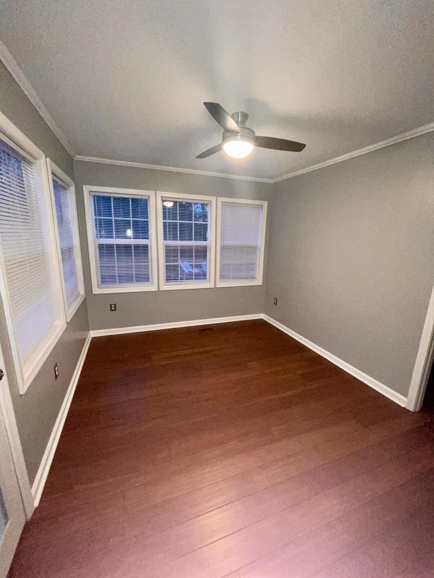 2143 Deep Woods Road Hardy, VA 24101 - Photo 10 of 27 an empty room with wooden floor and windows