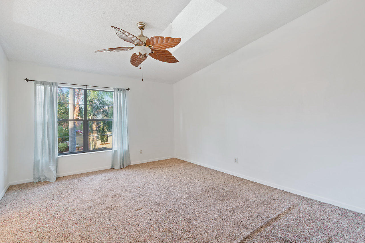 8815 Southwest 21st Street, Unit D Boca Raton, FL 33433 - Photo 16 of 27 a view of an empty room with a window