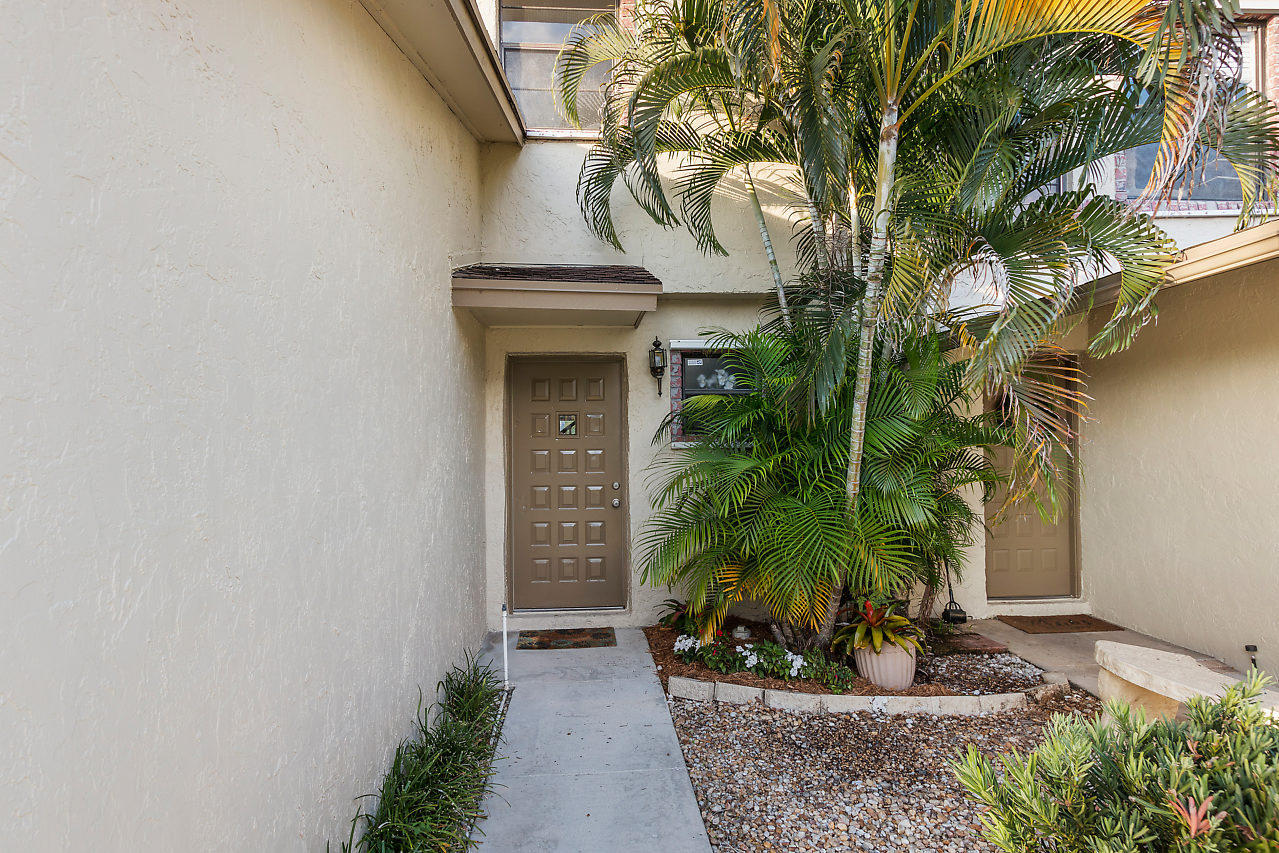 8815 Southwest 21st Street, Unit D Boca Raton, FL 33433 - Photo 3 of 27 a view of outdoor space and yard