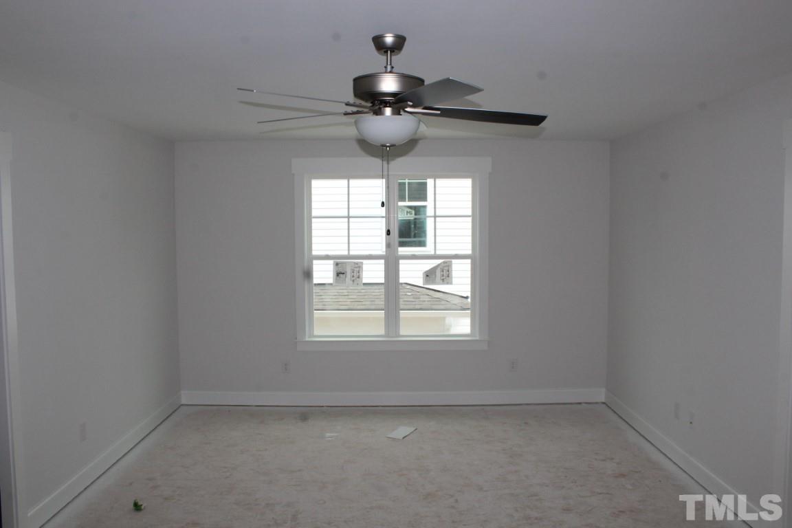 320 Prides Crossing Rolesville, NC 27571 - Photo 14 of 23 an empty room with a window