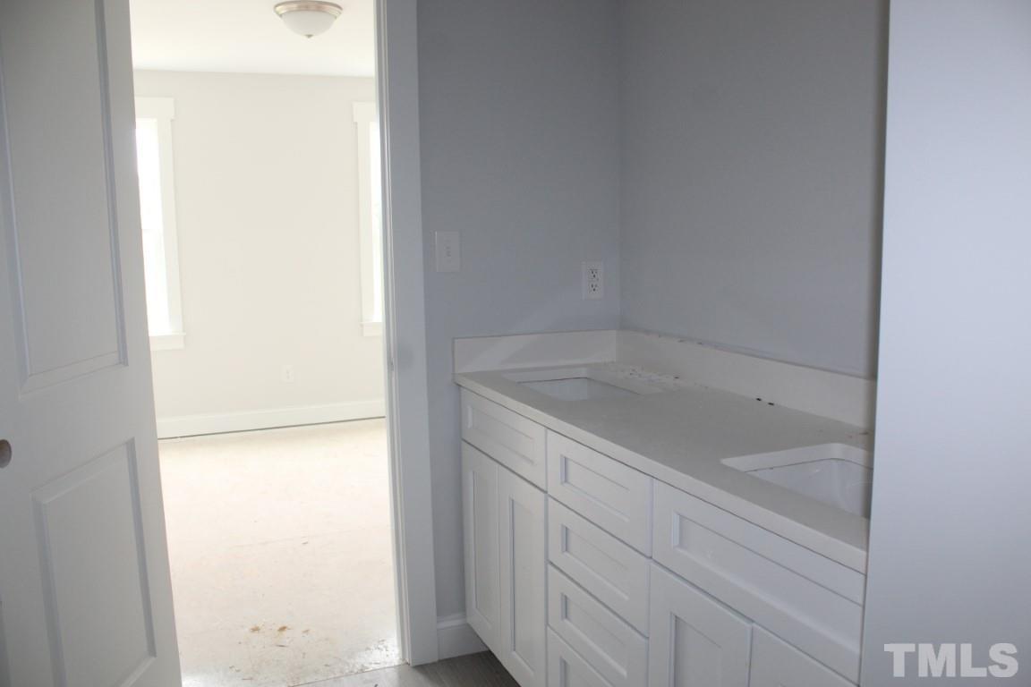 320 Prides Crossing Rolesville, NC 27571 - Photo 16 of 23 a bathroom with a bathtub