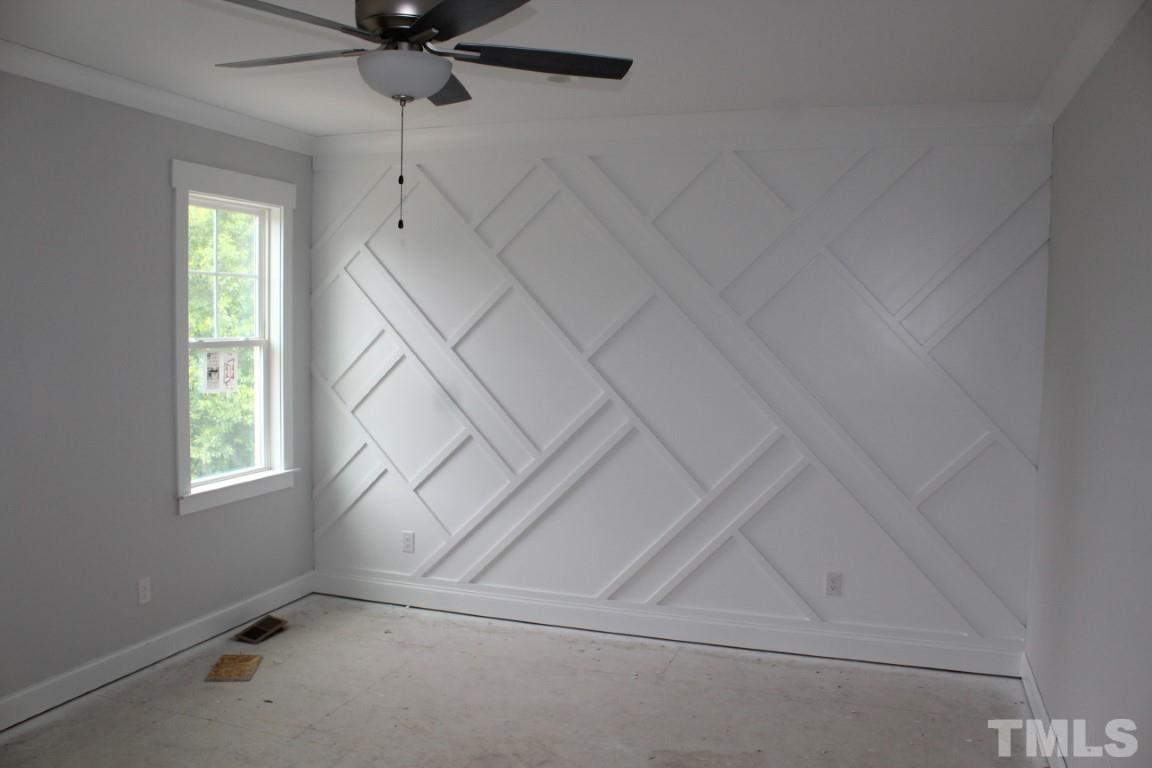 320 Prides Crossing Rolesville, NC 27571 - Photo 7 of 23 an empty room with windows