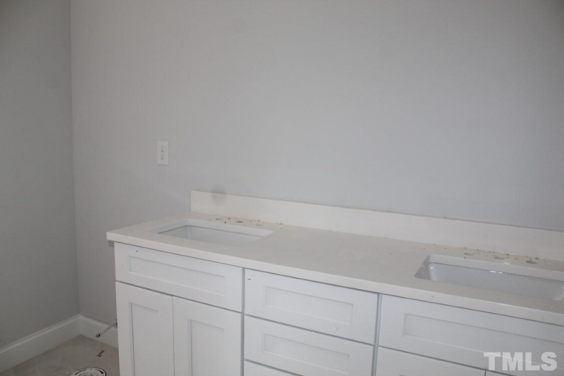 320 Prides Crossing Rolesville, NC 27571 - Photo 8 of 23 a utility room with a sink