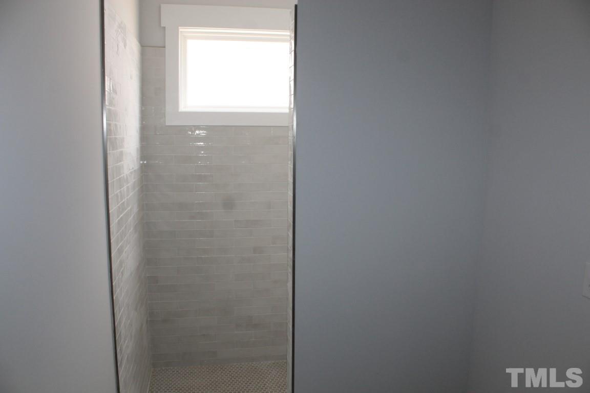 320 Prides Crossing Rolesville, NC 27571 - Photo 9 of 23 a bathroom with a window