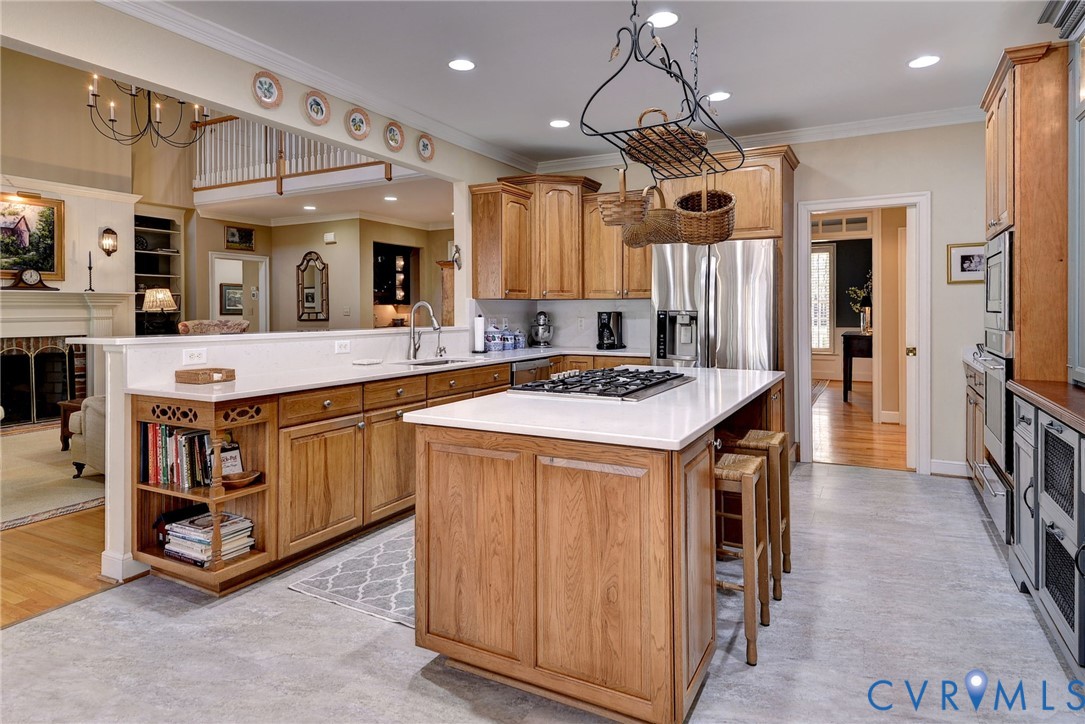1613 River Ridge Williamsburg, VA 23185 - Photo 20 of 82 Kitchen with a peninsula, ornamental molding, a ki