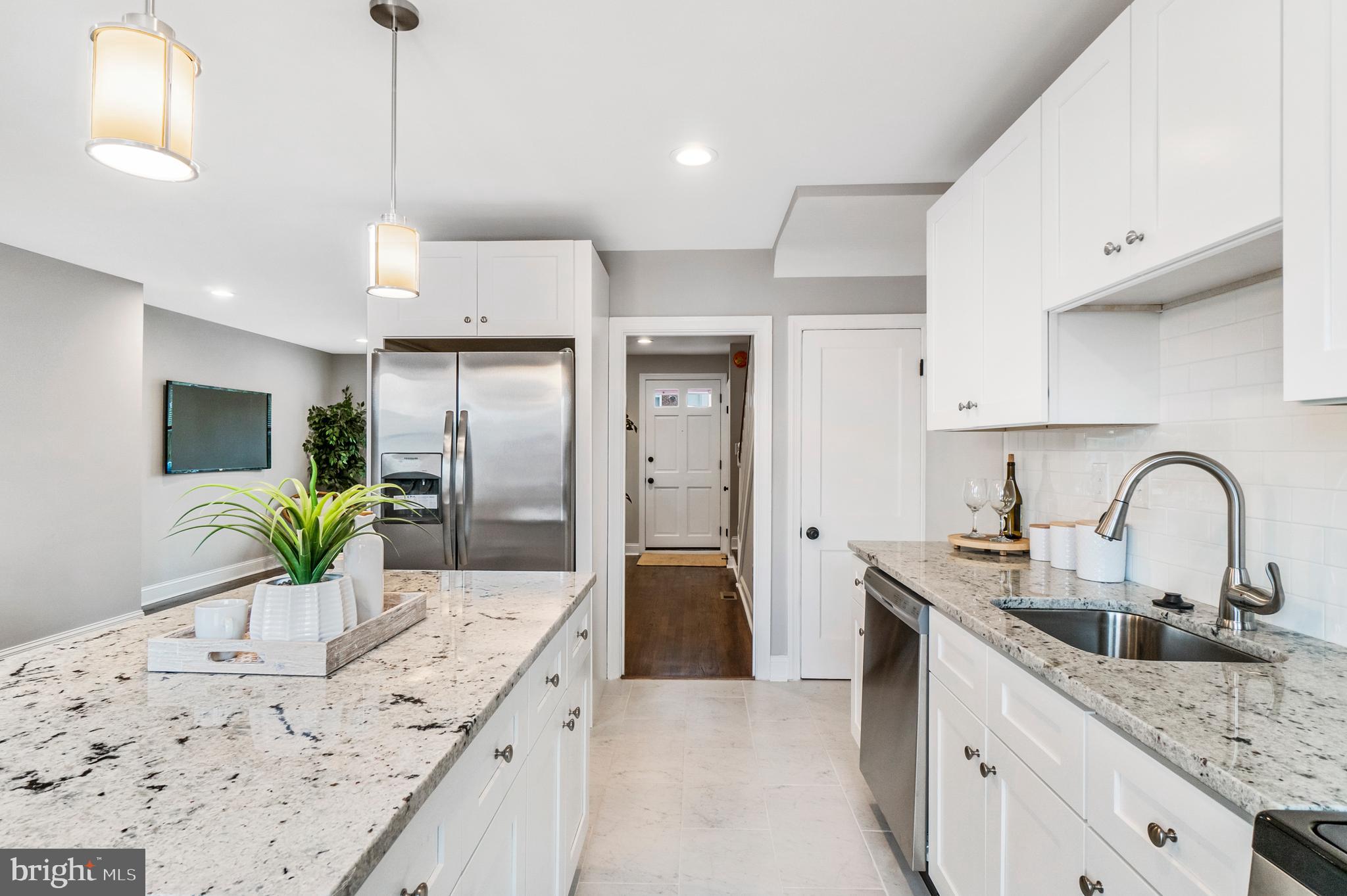 3933 Yolando Road Baltimore, MD 21218 - Photo 15 of 40 Kitchen with Refrigerator & Ice Maker