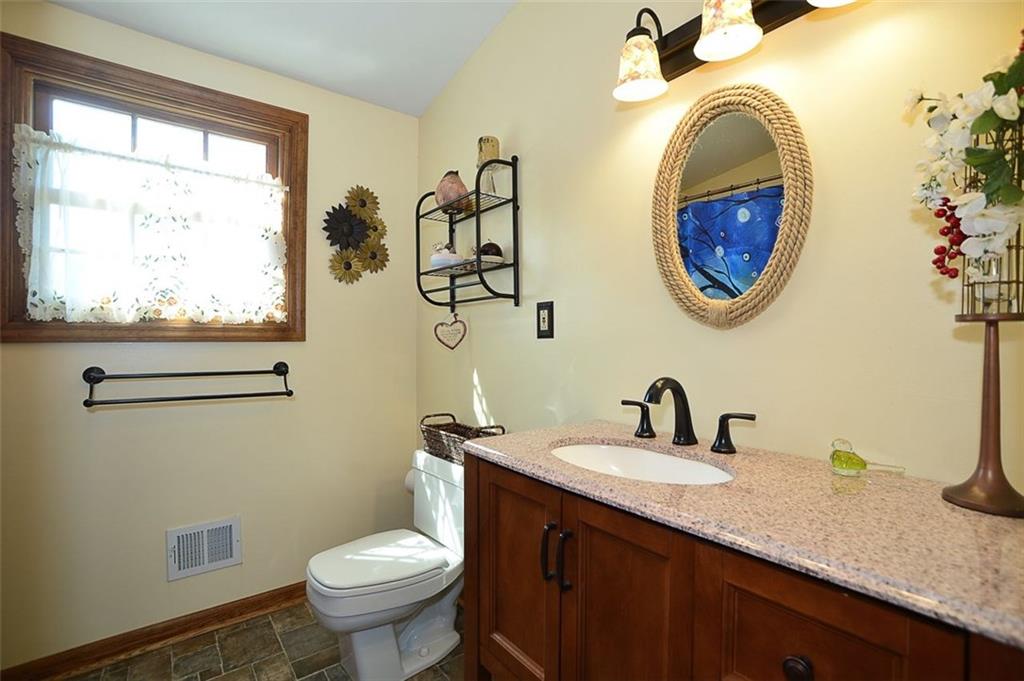 130 Ridgeview Lane Harmony, PA 16037 - Photo 18 of 24 The UPSTAIRS FULL BATH is updated & services both bedrooms 2 & 3. Cheerful window faces the woodlands.