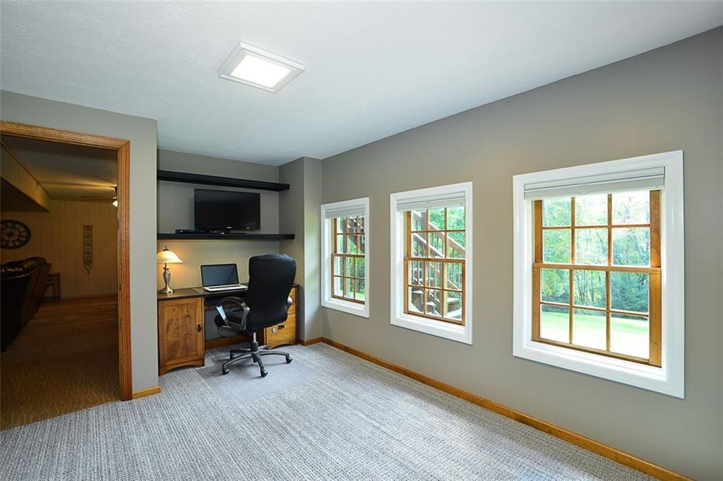 130 Ridgeview Lane Harmony, PA 16037 - Photo 21 of 24 Good-sized Basement Office/Den or bedroom 5 has plenty of room & also egress to the great outdoors!