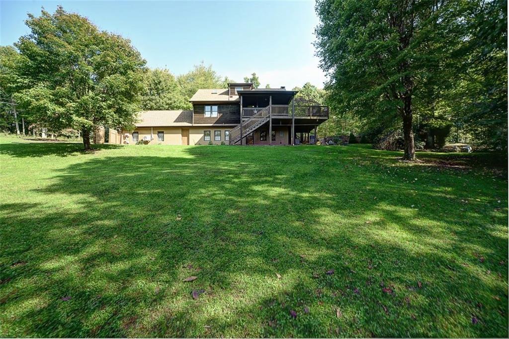 130 Ridgeview Lane Harmony, PA 16037 - Photo 6 of 24 REAR VIEW of the lovely & private 1.43 acre property.