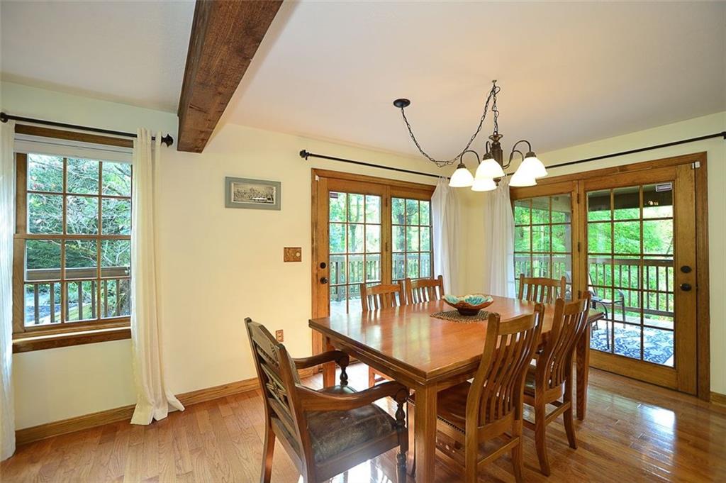 130 Ridgeview Lane Harmony, PA 16037 - Photo 9 of 24 The Dining Room adjoins the Living Room & the Kitchen for OPEN CONCEPT living. Add to that the dual access doors to the Open & Covered rear deck areas and you have wonderful expanded living options.