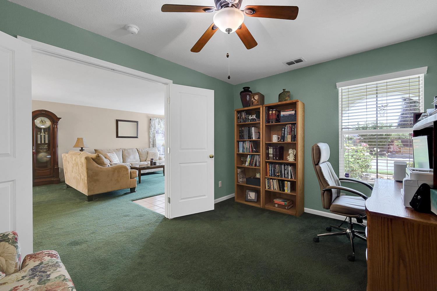 9840 Ellis Way Live Oak, CA 95953 - Photo 15 of 44 a view of a livingroom with workspace and a window