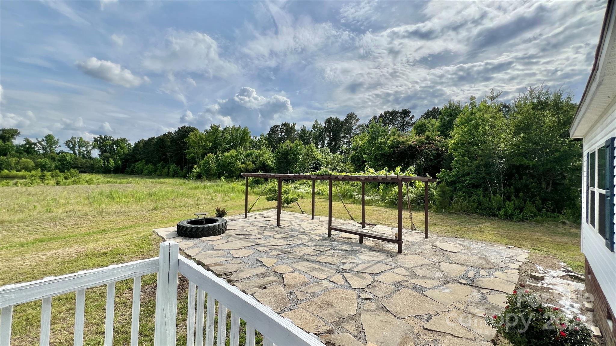 1824 Germantown Place Dillon, SC 29536 - Photo 5 of 16 a view of a garden with lawn chairs