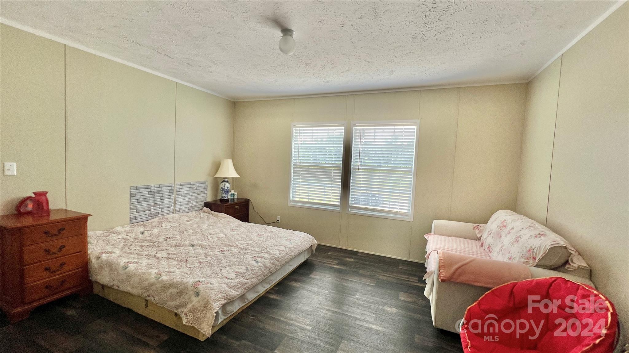 1824 Germantown Place Dillon, SC 29536 - Photo 9 of 16 a bedroom with a bed and window