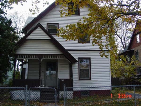 318 Eastern Avenue Springfield, MA 01109 - Photo 1 of 1 a front view of a house with garden
