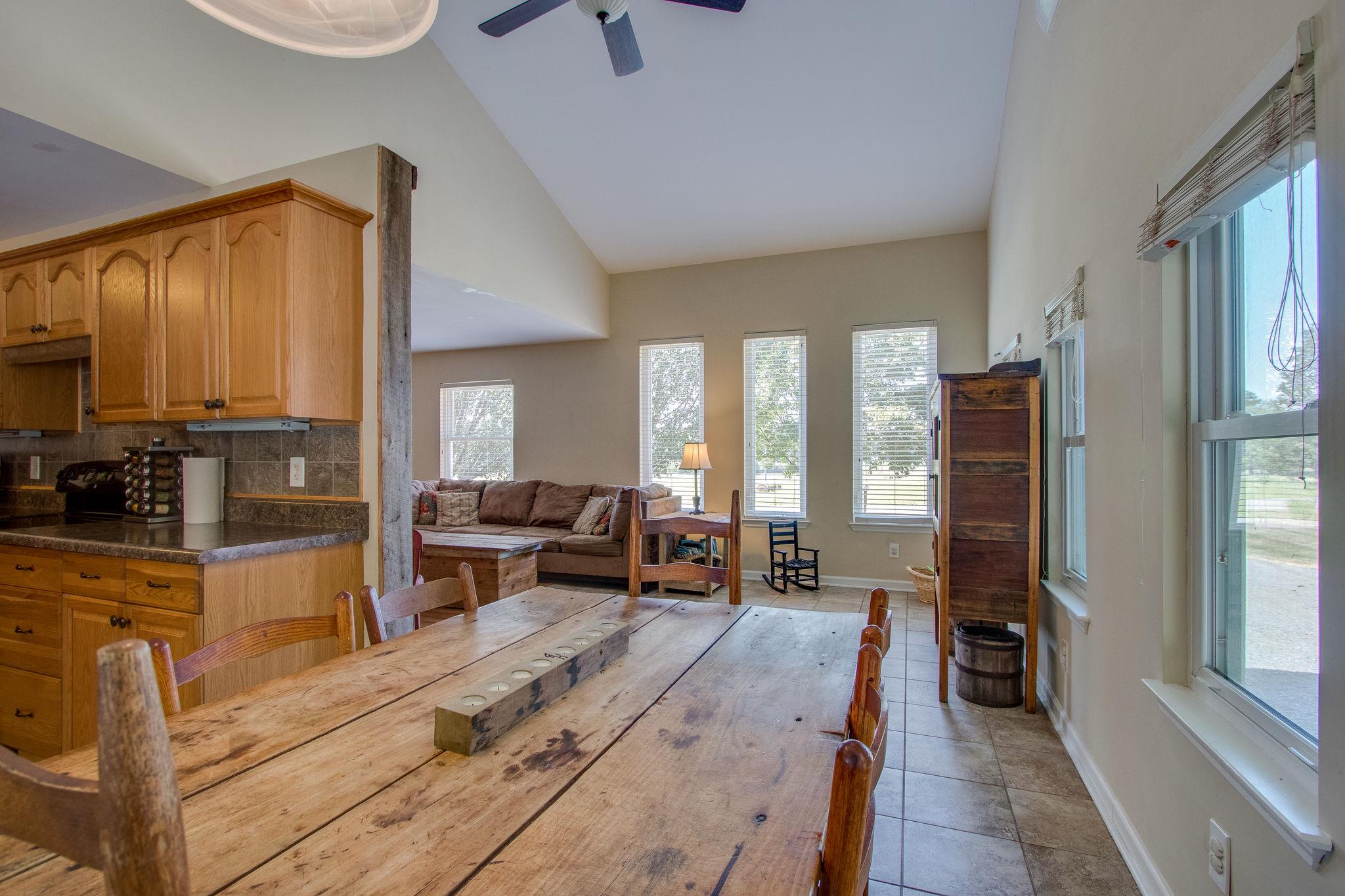 2461 Old Shannon Road Lebanon, TN 37090 - Photo 5 of 30 a large living room with stainless steel appliances furniture a large window and a wooden floor