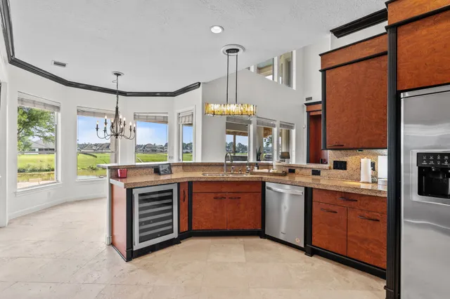 a bathroom with a toilet mirror and sink