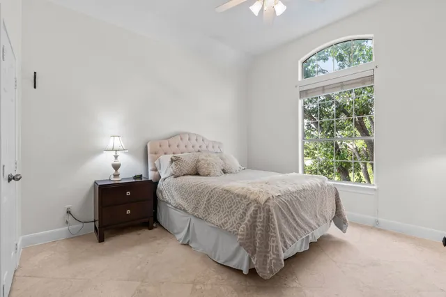 a view of a lake with houses in the back